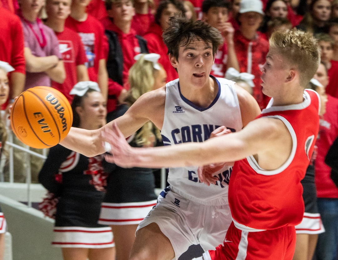 (Rick Egan | The Salt Lake Tribune) Peterson Lunt, Corner Canyon takes the ball down low, as Wells Robertson defends for American Fork, in the Boys 6A State Championship at Weber State, on Saturday, March 4, 2023.