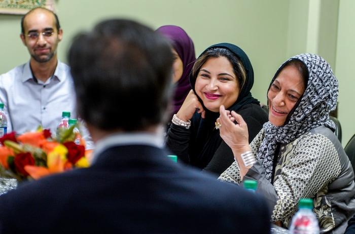 Leah Hogsten  |  The Salt Lake Tribune  Dr. Nusrat Ahmed, right, shares a laugh with fellow members of the center while talking with U.S. Senate candidate Mitt Romney, Oct. 26, 2018 before Friday's special prayers.