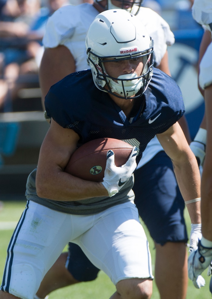 (Rick Egan  |  The Salt Lake Tribune)  Austin Kafentzis runs with the ball, during  a BYU public scrimmage at Lavell Edwards Stadium, Thursday, August 17, 2017.
