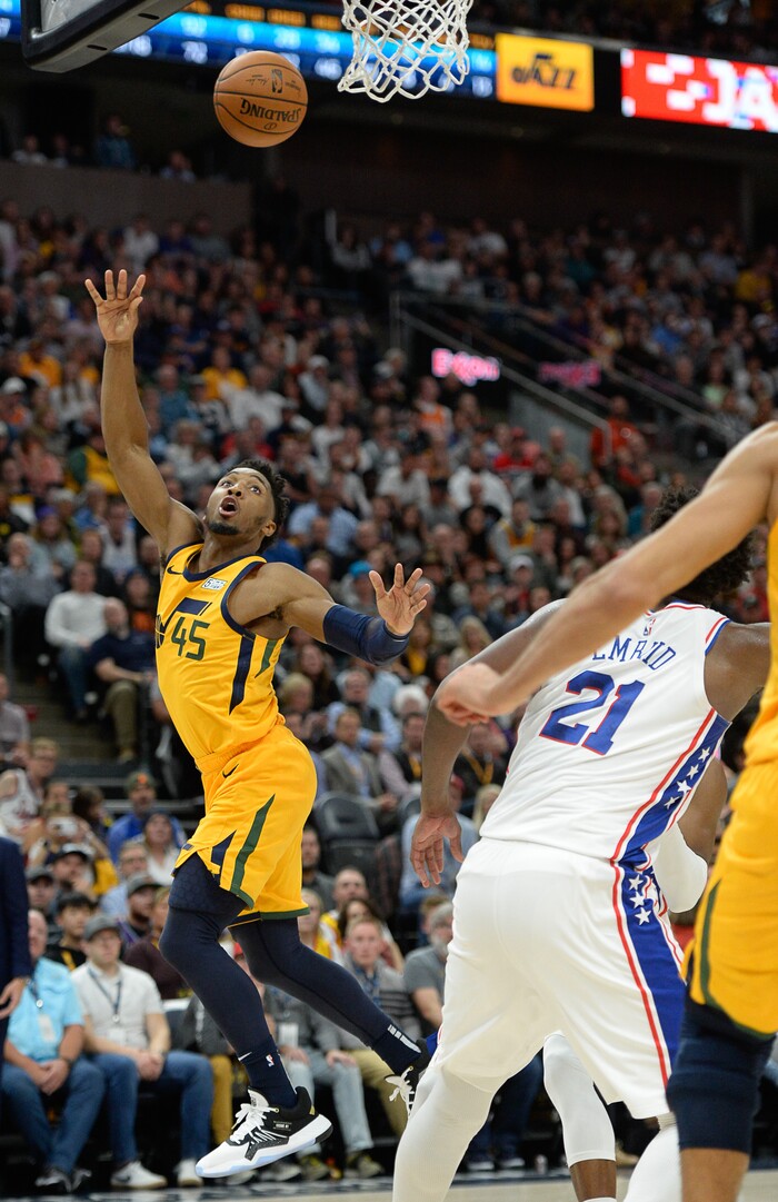 (Francisco Kjolseth  |  The Salt Lake Tribune)  Utah Jazz guard Donovan Mitchell (45) gets the point as the Utah Jazz host the Philadelphia 76ers in their NBA basketball game at Vivint Smart Home Arena in Salt Lake City on Wednesday, Nov. 6, 2019.