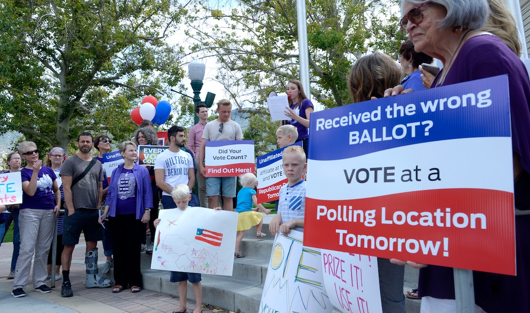 (Al Hartmann  |  The Salt Lake Tribune) Mormon Women for Ethical Government, Salt Lake Indivisible and Action Utah members rally against the confusing process of special election to fill Chaffetz' 3rd District seat outside the historical courthouse in Provo Monday Aug 14. 