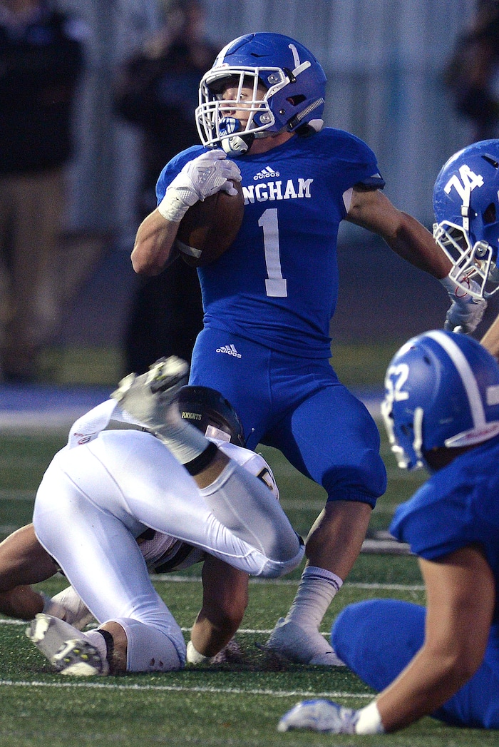 (Leah Hogsten | The Salt Lake Tribune) Bingham's Braedon Wissler is brought down. Bingham High School leads Lone Peak High School, 14-3 during their game Friday, September 28, 2017 in South Jordan.