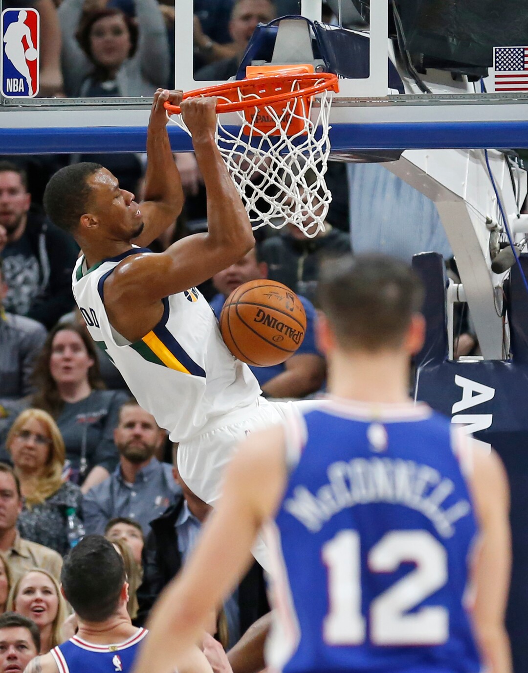Utah Jazz guard Rodney Hood (5) dunks against the Philadelphia 76ers during the second half during an NBA basketball game Tuesday, Nov. 7, 2017, in Salt Lake City. (AP Photo/Rick Bowmer)