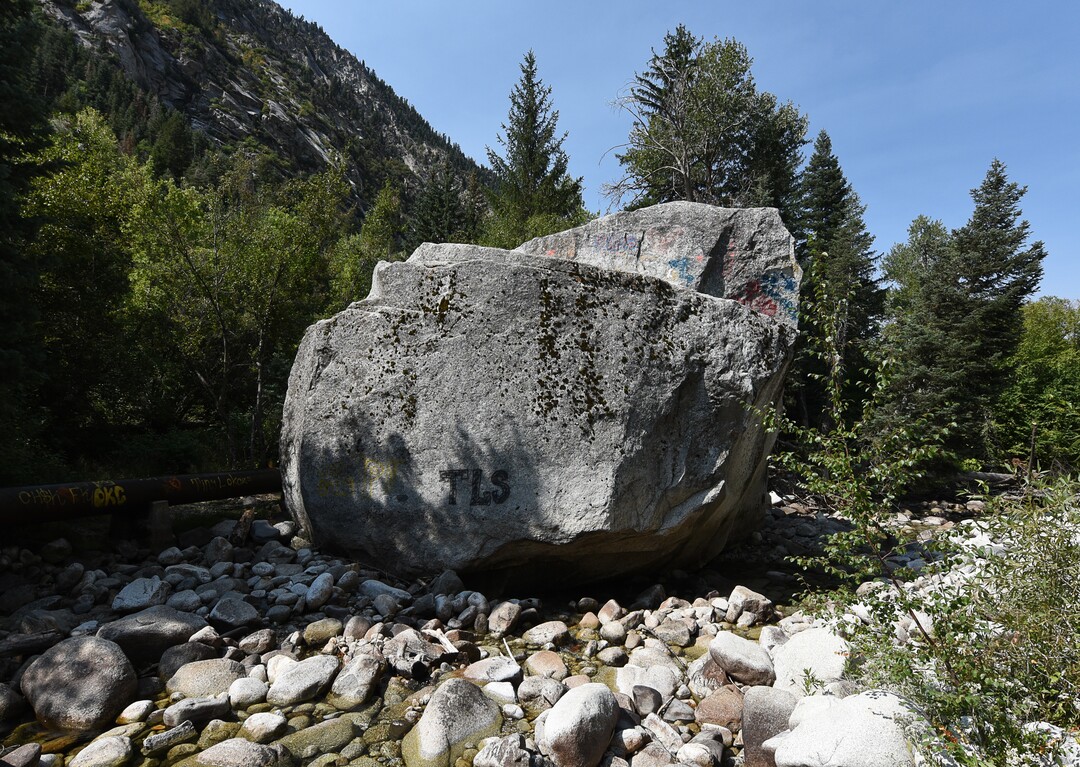 (Francisco Kjolseth  |  The Salt Lake Tribune)  Graffiti has proliferated in lower Little Cottonwood Canyon, where vandals, often wielding cans of fluorescent-colored spray paint, have covered granite faces, trees and structures. The vandalism is particularly apparent along the Temple Quarry Trail and the creek at the Moon Rock swimming hole and former pavilion site. Volunteers using donated equipment and solvents spend thousands of hours removing the paint from the rocks only to see graffiti return to the same faces or on rock nearby.