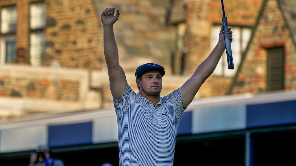 DUPLICATE*** Bradley Dredge, of Wales,*** Brad Dalke, of the United States,*** Bryson DeChambeau, of the United States, reacts after sinking a putt for par on the 18th hole to win the US Open Golf Championship, Sunday, Sept. 20, 2020, in Mamaroneck, N.Y. (AP Photo/Charles Krupa)