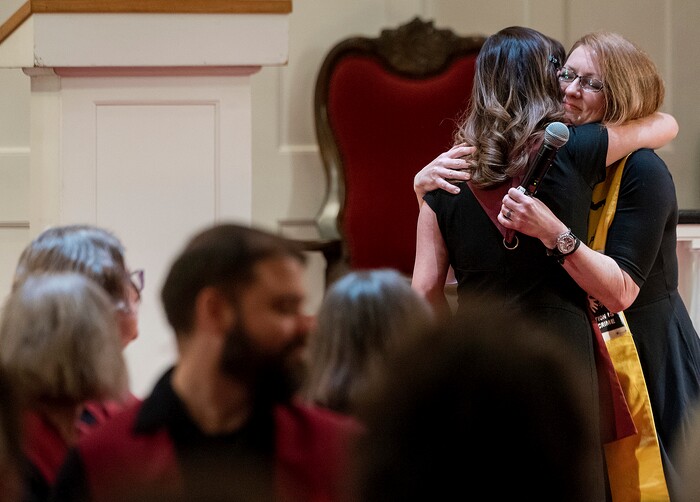 (Michael Mangum  |  Special to the Tribune)

Vicky Chavez, left, hugs Rev. Monica Dobbins during a vigil held at First Unitarian Church in Salt Lake City, UT on Wednesday, January 30th, 2019. The vigil marked the one-year anniversary of when Chavez came to the church with her children seeking sanctuary from deportation.