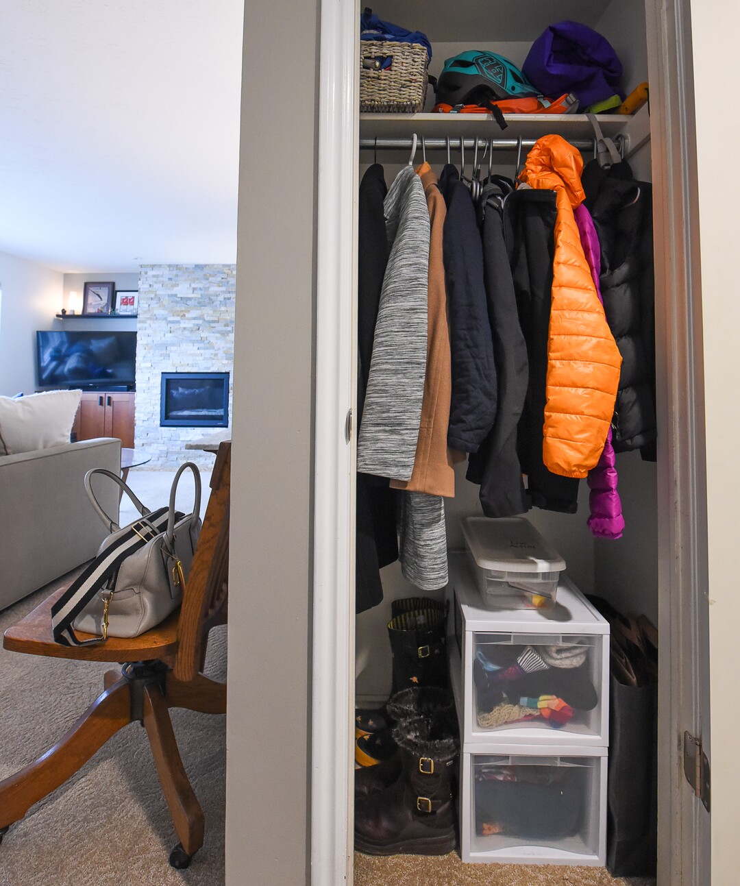 (Francisco Kjolseth  |  The Salt Lake Tribune)  A closet has been paired down significantly by Blair Tomten, who has been using the Kondo method to tidy up her home in Millcreek, after she started using the process four years ago after being inspired by the minimalism approach to tackling your stuff category by category as opposed to room by room. A plastic bin holds the "live action" items that are in the process of being dealt with. 