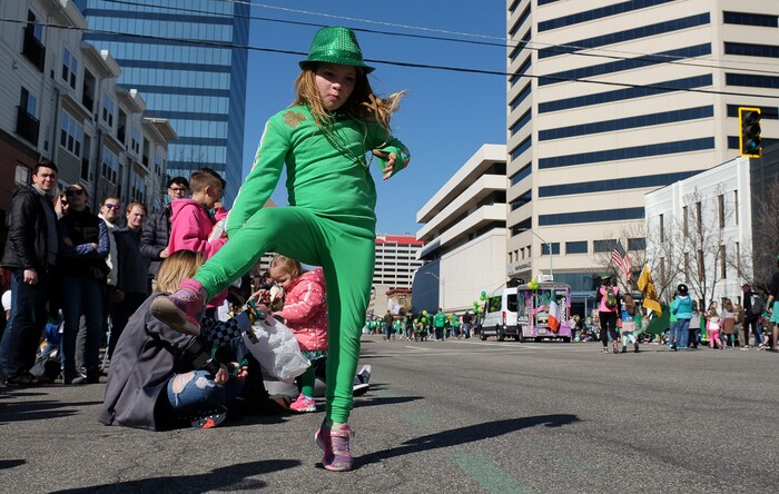 (Francisco Kjolseth | The Salt Lake Tribune) Paytin Driscoll, 7, dances along to the sounds of various bands playing as Salt Lake CityÕs Irish community celebrates their 41st annual St. PatrickÕs Day Parade with crowds lining up to take in the festivities.