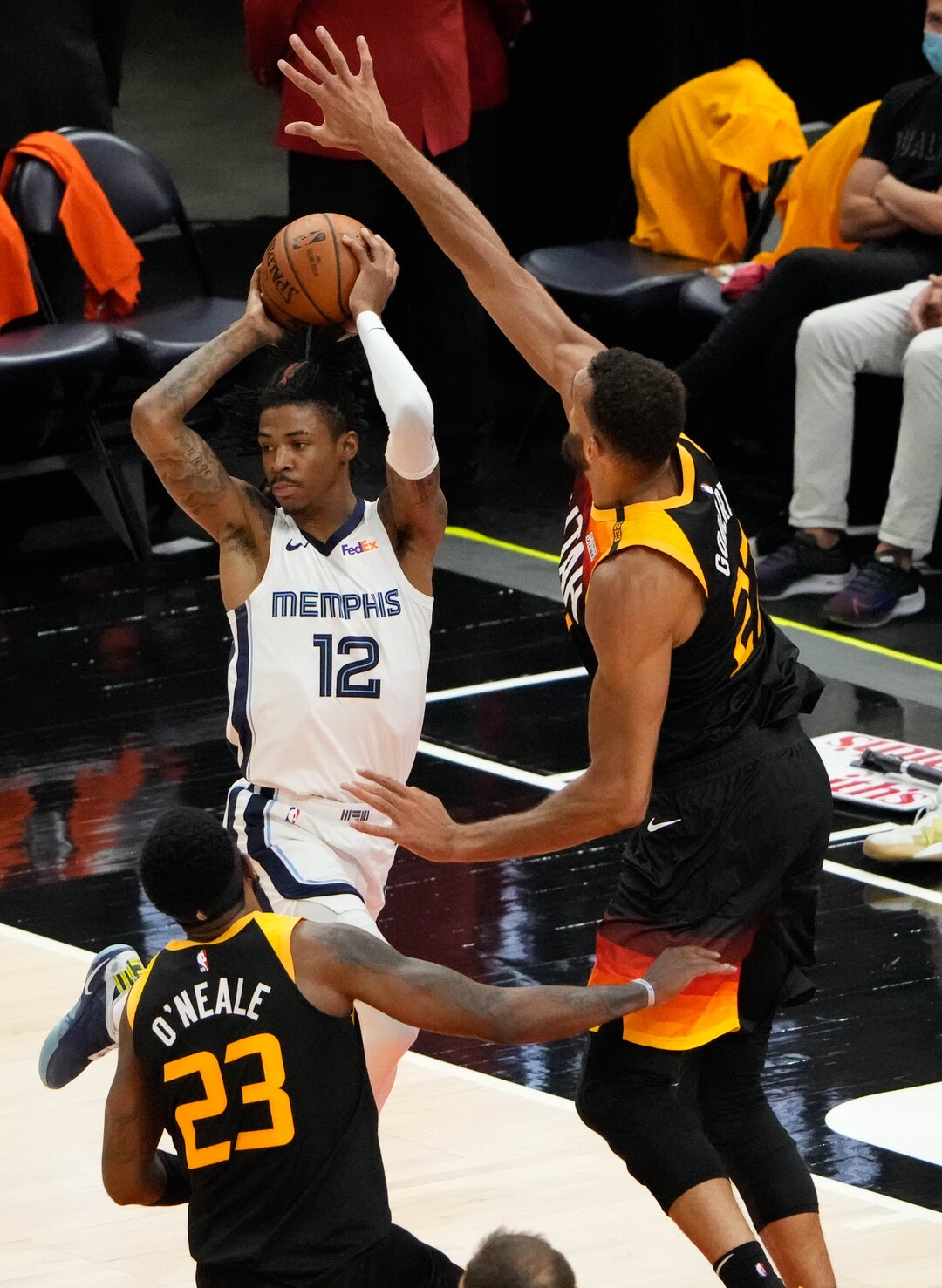 (Francisco Kjolseth | The Salt Lake Tribune) Memphis Grizzlies guard Ja Morant (12) opts for another choice as Utah Jazz center Rudy Gobert (27) defends in the first half of Game 5 of an NBA basketball first-round playoff series Wednesday, June 2, 2021, in Salt Lake City, UT.