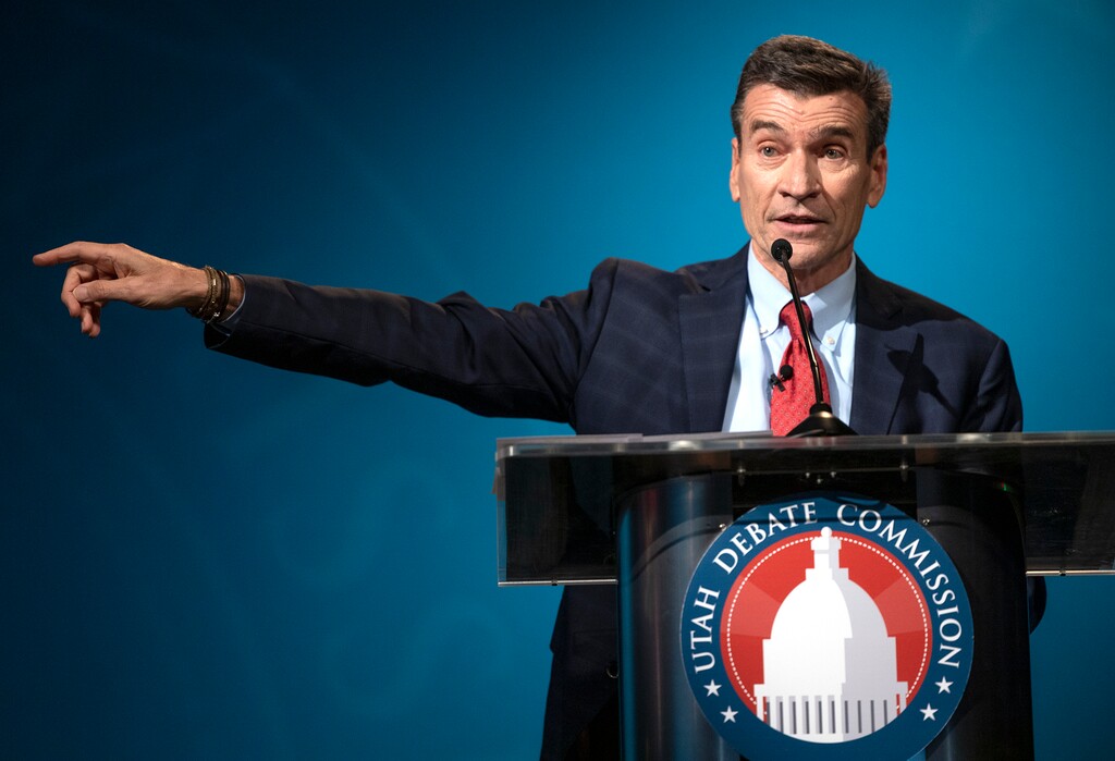 (Scott G Winterton | Deseret News/pool) Defense Attorney Greg Skordas gestures toward Utah Attorney General Sean D. Reyes as he answers a question during a debate in the KSL studios in Salt Lake City on Wednesday, Oct. 21, 2020.