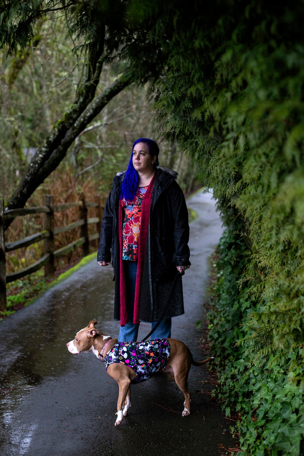 Emily James, who was fired from her job at a call center for U.S. Bank after giving 20 dollars of her own money to a customer on Christmas Eve, with Harley Quinn, an emotional support dog, in Portland, Ore., on Jan. 29, 2020. "U.S. Bank shows what it means when it says its employees should 'do the right thing,'" writes Nicholas Kristof. (Alisha Jucevic/The New York Times)