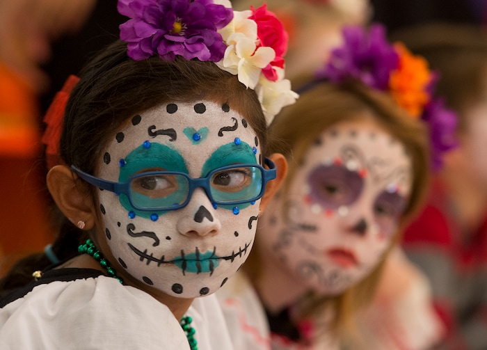 (Leah Hogsten | The Salt Lake Tribune) Arte Primero dancer Itzel Soperaez waits to perform the Ribbon Dance as part of the Day of the Dead festival Saturday, October 21, 2017 at the Capitol.