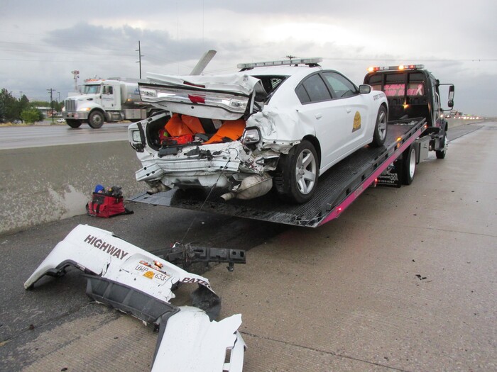 (Courtesy Utah Highway Patrol) A pickup truck slammed into the rear end of a Utah Highway Patrol patrol car early Friday, leaving a trooper with minor injuries.
