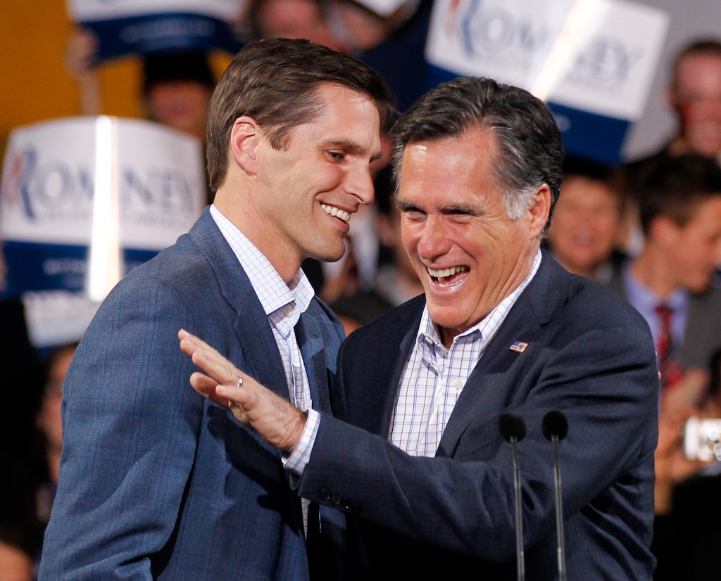 Republican presidential candidate former Massachusetts Gov. Mitt Romney arrives for an election night rally with his son Josh in Denver, Tuesday, Feb. 7, 2012. (AP Photo/Chris Carlson)