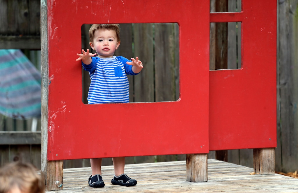 (Elaine Thompson | AP file photo)

In this Aug. 27, 2018, photo, Vincent Seeborn, 2, reaches out from a structure on the playground at the Wallingford Child Care Center in Seattle.