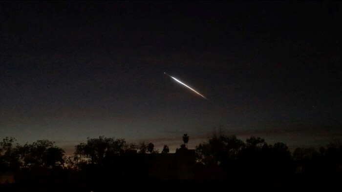 The contrail from a SpaceX Falcon 9 rocket is seen from Pasadena, Calif., about 150 miles east from its launch site in Vandenberg Air Force Base, Calif., on Friday, Dec. 22, 2017. A reused SpaceX rocket has carried 10 satellites into space from California, leaving behind it a trail of mystery and wonder. The Falcon 9 booster lifted off from coastal Vandenberg Air Force Base shortly before 5:30 p.m. Friday. It carried the latest batch of satellites for Iridium Communications. (AP Photo/John Antczak)