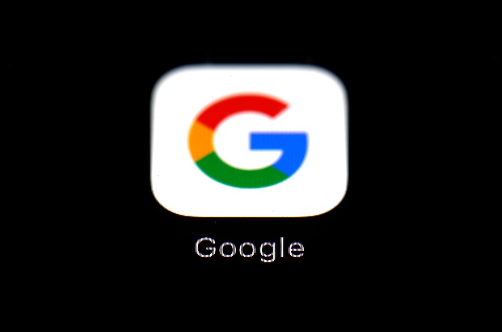 This March 19, 2018, photo shows the Google app on an iPad in Baltimore. On Tuesday, March 27, a federal appeals court overturned a decision in a long-running legal battle over whether Google infringed on Oracle's Java programming language to build its hugely popular mobile operating system, Android. (AP Photo/Patrick Semansky)