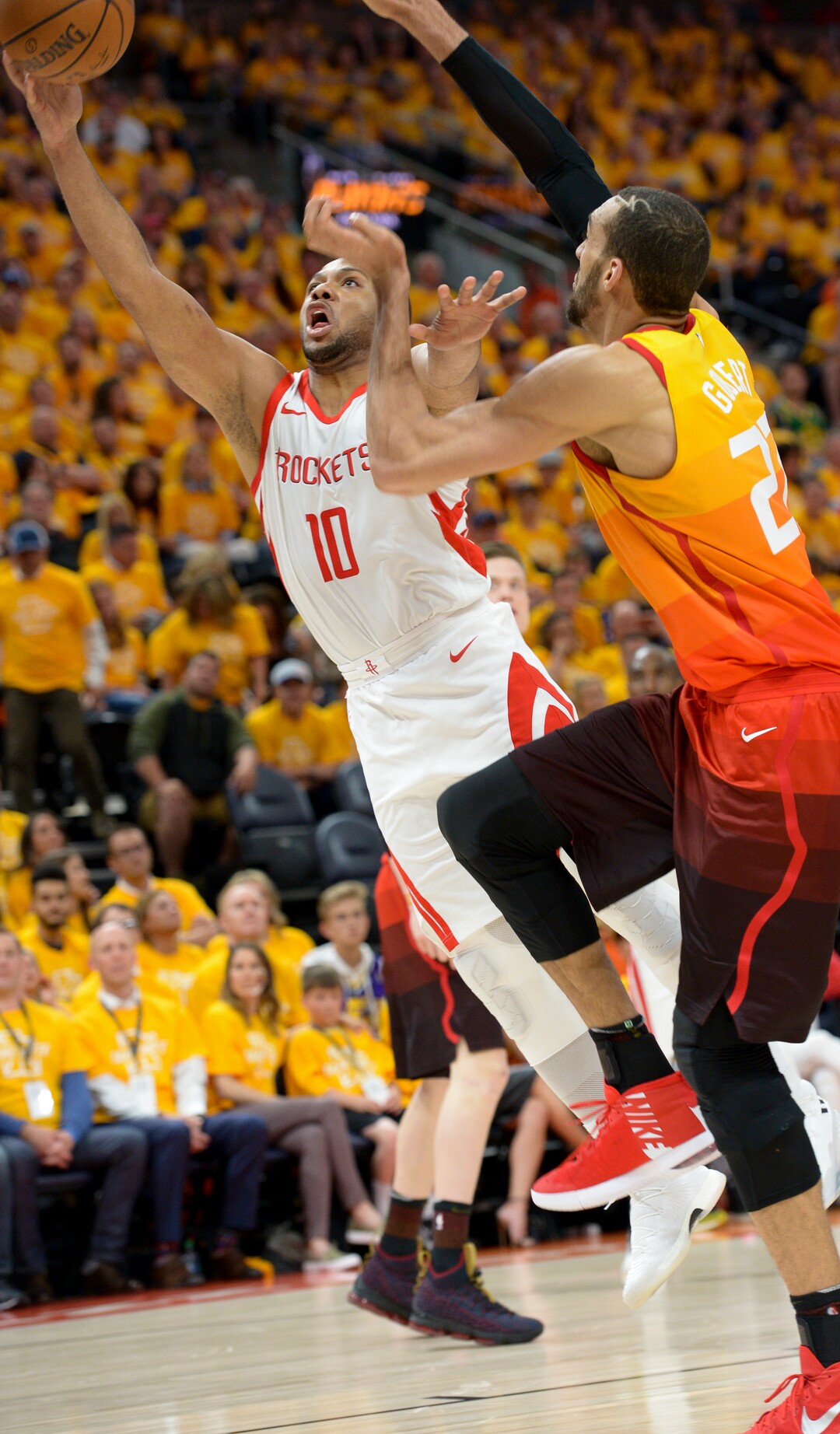 (Leah Hogsten  |  The Salt Lake Tribune)  Houston Rockets guard Eric Gordon (10) drives to the net around Utah Jazz center Rudy Gobert (27).  The Houston Rockets defeated the Utah Jazz 113-92 in Game 3 of an NBA basketball second-round playoff series Friday, May 4, 2018 in Salt Lake City.