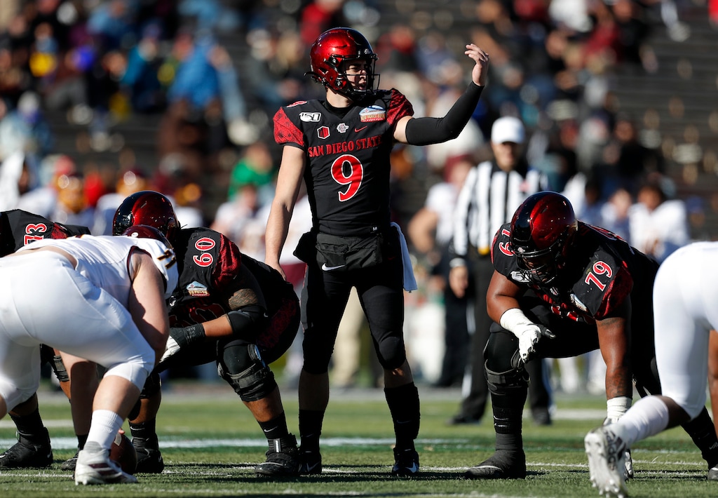 San Diego State quarterback Ryan Agnew (9) signals before the snap during the first half of the New Mexico Bowl NCAA college football game against Central Michigan on Saturday, Dec. 21, 2019 in Albuquerque, N.M. (AP Photo/Andres Leighton)