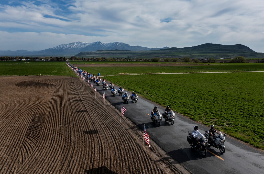 (Leah Hogsten | The Salt Lake Tribune) Members of the Utah Highway Patrol Motor Squad lead the funeral procession down 100 West in Newton for former U.S. Senator Orrin Hatch, Friday, May 6, 2022. Hatch, the longest-serving Republican senator in U.S. history and the longest-serving from Utah, died April 23 at age 88 and was interred at Newton Cemetery.