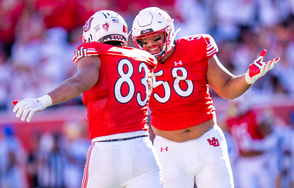 (Rick Egan | The Salt Lake Tribune)  Utah Utes defensive end Jonah Elliss (83) and Utah defensive tackle Junior Tafuna (58) celebrate  after Ellis's sack on UCLA Bruins quarterback Dante Moore (3), in the final Bruin drive in the 4th quarter, in PAC-12 football action between the Utah Utes and the UCLA Bruins, at Rice-Eccles Stadium, on Saturday, Sept. 23, 2023.