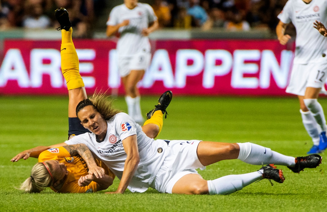 (Rick Egan  |  The Salt Lake Tribune)    Utah Royals FC midfielder Gunnhildur Jónsdóttir (66) collides with Portland Thorns FC defender Katherine Reynolds (2), in Soccer action between Utah Royals FC and Portland Thorns FC, in Sandy, Friday, July 19, 2019.