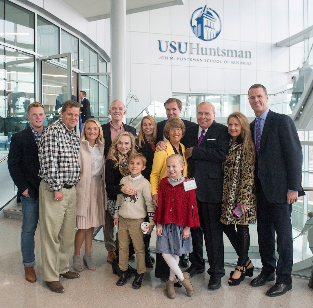 (Rick Egan  |  The Salt Lake Tribune) Jon Huntsman gathers together with some of his family members as they celebrate the new $50 Million building in the Jon M. Huntsman School of Business, Wednesday, March 16, 2016.