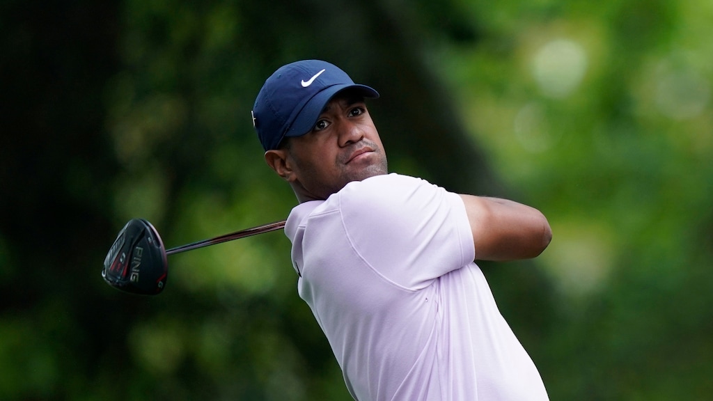 (AP Photo/David J. Phillip) Tony Finau hits on the second hole during the first round for the Masters golf tournament Thursday, April 11, 2019, in Augusta, Ga.
