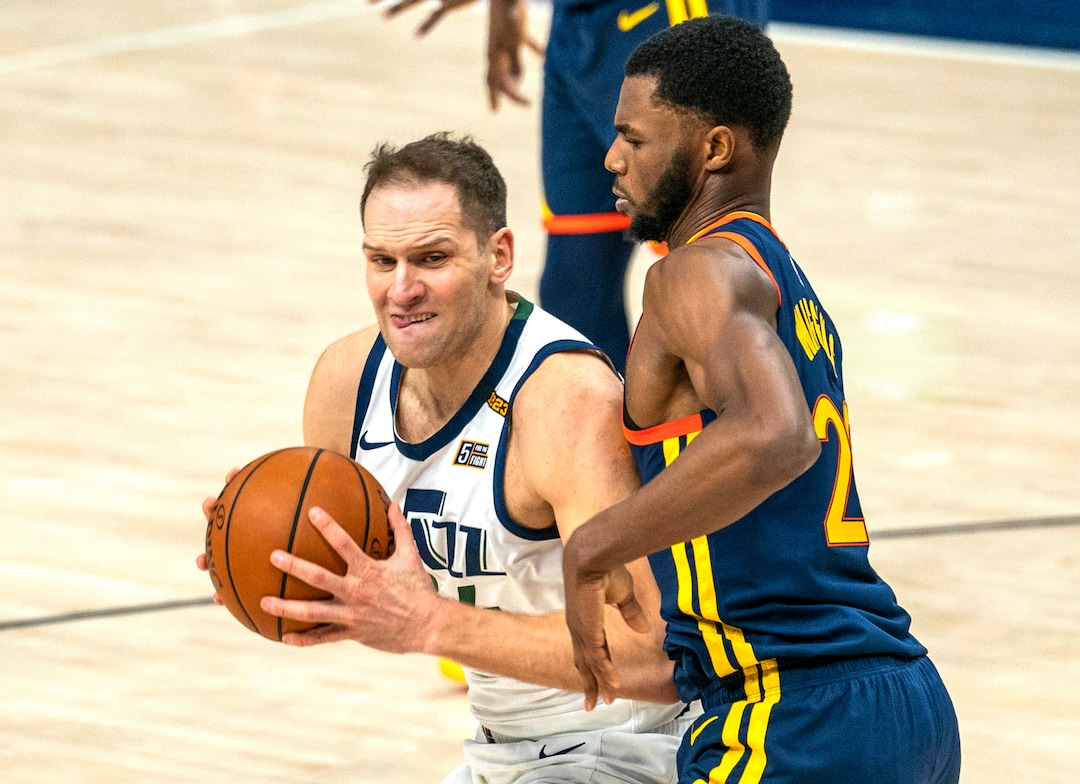 (Rick Egan | The Salt Lake Tribune) Utah Jazz forward Bojan Bogdanovic (44) takes the ball inside as Golden State Warriors forward Andrew Wiggins (22)  defends, in NBA action between the Utah Jazz and the Golden State Warriors at Vivint Arena, on  Saturday, Jan. 23, 2021.