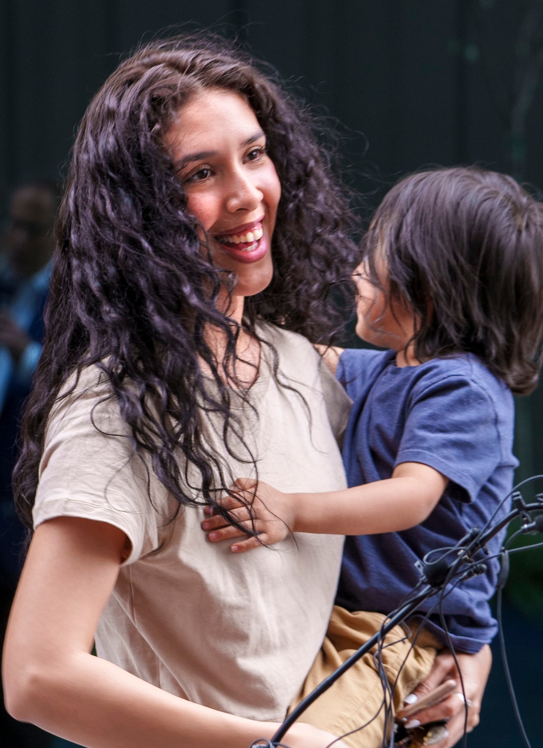 (Leah Hogsten | The Salt Lake Tribune)  Stephanie Ramirez, holding her 4-year-old son, James, talks about living downtown at The Aster, a new complex at 255 S. State Street, which offers 190 residential and mixed-income units, open-air spaces and community gathering spaces, May 2, 2023.