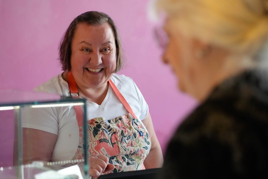 (Francisco Kjolseth | The Salt Lake Tribune) Romina Rasmussen, owner of Les Madeleines, the 19-year-old French pastry cafe in downtown Salt Lake City speaks with a customer on Tuesday, Nov. 15, 2022.