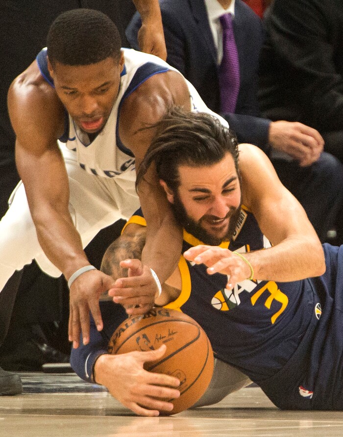 (Rick Egan  |  The Salt Lake Tribune)  Utah Jazz guard Ricky Rubio (3) goes for a loose ball along with Dallas Mavericks guard Dennis Smith Jr. (1), in NBA action Utah Jazz vs. Dallas Mavericks, in Salt Lake City, Monday, October 30, 2017.