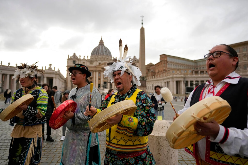(AP Photo/Alessandra Tarantino) Members of the Assembly of First Nations perform in St. Peter's Square at the Vatican, Thursday, March 31, 2022. Pope Francis has welcomed First Nations delegations to the Vatican. They are seeking an apology for the Catholic Church's role in running Canada's notorious residential schools for Indigenous children.