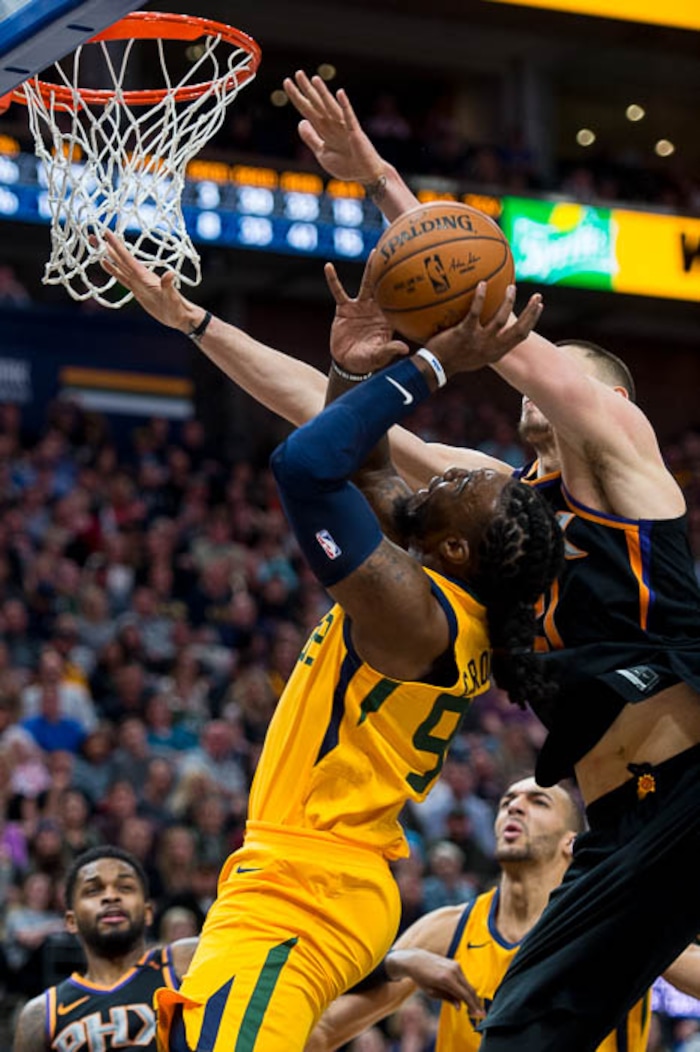 (Trent Nelson | The Salt Lake Tribune)  Utah Jazz forward Jae Crowder (99) defended by Phoenix Suns center Alex Len (21) as the Utah Jazz host the Phoenix Suns, NBA basketball in Salt Lake City, Wednesday Feb. 14, 2018.