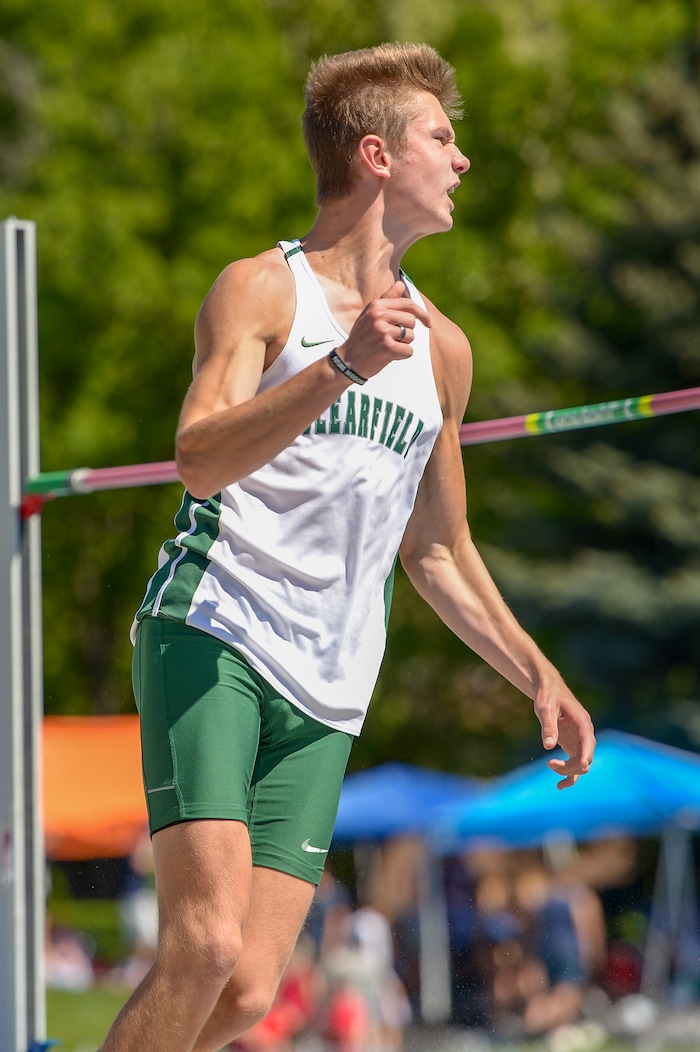 (Leah Hogsten | The Salt Lake Tribune) Clearfield's Justin Brown celebrates clearing 6' 6" in the 6A Boys' High Jump at the 2018 Utah UHSAA State Track and Field Championships at Clarence Robison Track on the campus of Brigham Young University in Provo, Thursday, May 17, 2018.