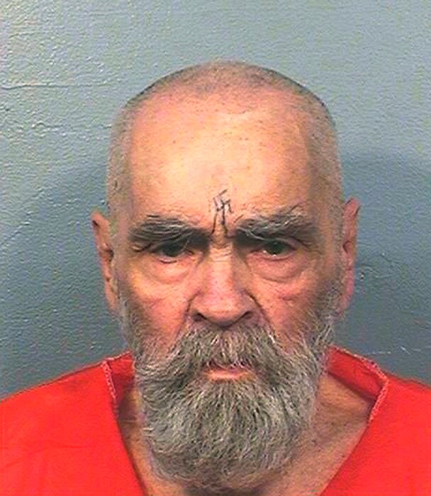FILE - This Aug. 14, 2017, file photo provided by the California Department of Corrections and Rehabilitation shows Charles Manson. The fight over the estate of apocalyptic cult leader Manson has fragmented into at least three competing camps that could cash in on songs he wrote that were used by The Beach Boys and Guns N’ Roses. A Los Angeles judge on Monday, Jan. 8, 2018, will begin trying to sort out at least two conflicting wills and claims to his estate by a purported son, grandson and pen pal. Manson died at 83 in November 2017. (California Department of Corrections and Rehabilitation via AP, File)