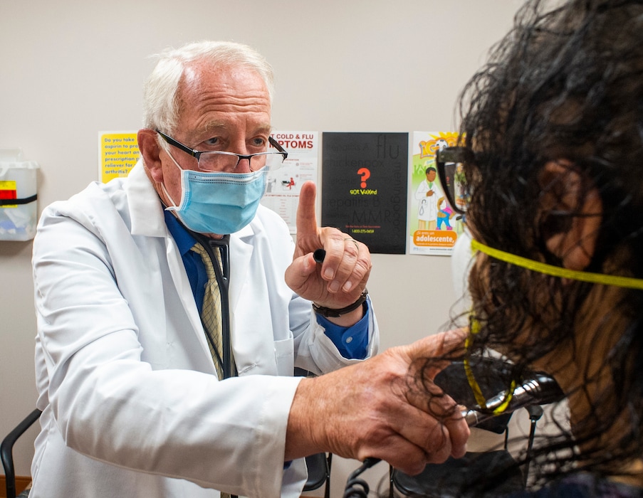 (Rick Egan  |  The Salt Lake Tribune)     Dr. David Sundwall checks out a patient at the Health Clinics of Utah clinic at 168 N. 1950 West, on Thursday, July 30, 2020.