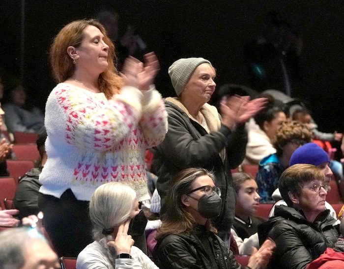 (Leah Hogsten | The Salt Lake Tribune) Gina Kirby, left, and her mother Sharon Werman clap to the singing of the Resistance Revival Chorus at the rally at East High School on Monday. To commemorate the legacy and work of Martin Luther King, Jr. and many other activists fighting for racial equality during the Civil Rights movement, the University of Utah's office of Equity, Diversity & Inclusion kicked off MLK Week 2023 with a rally at East High School, followed by a march to Kingsbury Hall, Jan. 16, 2023. 