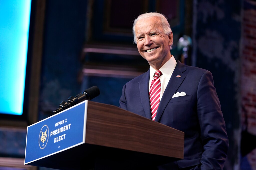 President-elect Joe Biden, accompanied by Vice President-elect Kamala Harris, speaks about economic recovery at The Queen theater, Monday, Nov. 16, 2020, in Wilmington, Del. (AP Photo/Andrew Harnik)