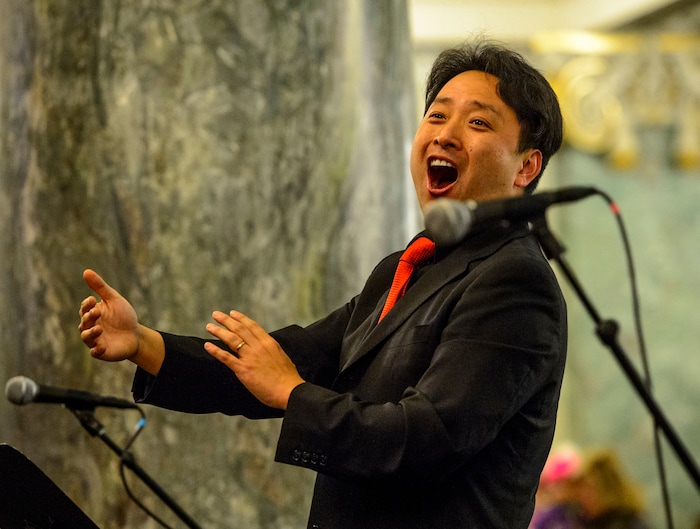 (Steve Griffin  |  The Salt Lake Tribune)  Masa Fukuda directs the One Voice Children's Choir during a concert at the Joseph Smith Memorial Building in Salt Lake City Friday December 8, 2017.