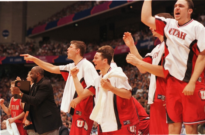 (Steve Griffin  |  Tribune file photo)  Utah bench erupts in first half of the 1998 championship game against Kentucky in San Antonio, Texas.