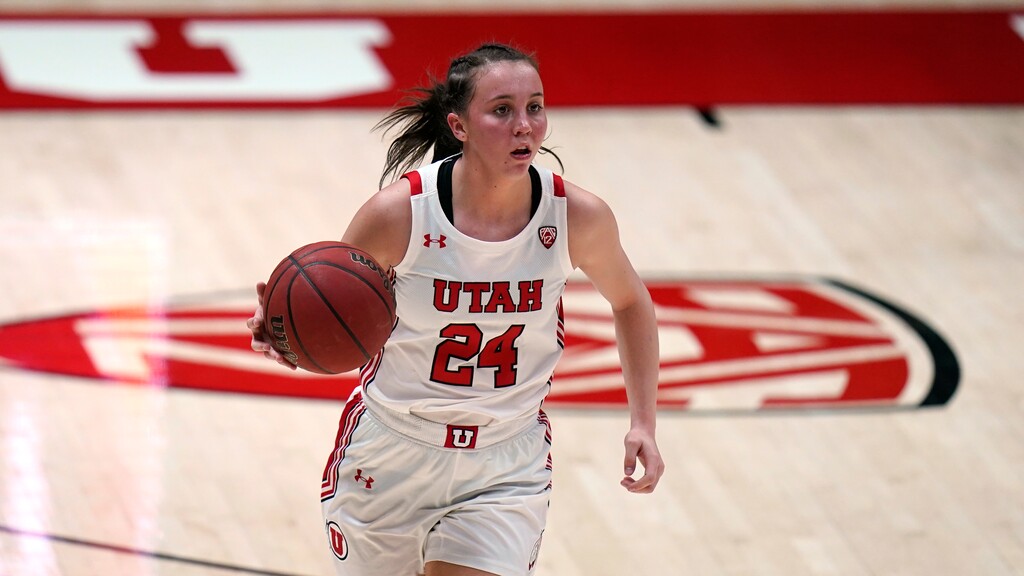 Utah guard Kennady McQueen (24) brings the ball up court in the second half during an NCAA college basketball game aGAINST against the Stanford Friday, Jan. 15, 2021, in Salt Lake City. (AP Photo/Rick Bowmer)