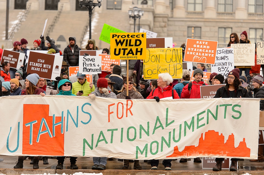 (Trent Nelson | The Salt Lake Tribune)  Protesters gather before a visit by President Donald Trump, Monday December 4, 2017.