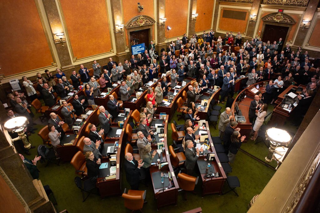 (Trent Nelson | The Salt Lake Tribune)
A full House Chamber stands and applauds families who lost loved ones in law enforcement, military and public service as Governor Gary Herbert delivers his State of the State address at the Utah Capitol in Salt Lake City on Wednesday Jan. 30, 2019.