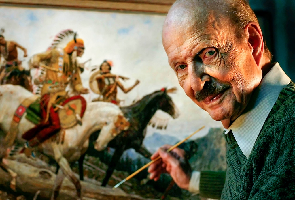 (Chris Detrick | The Salt Lake Tribune) Arnold Friberg poses with one of his works in progress in his Salt Lake City studio in 2006. Earlier in his career, Friberg painted portraits of Queen Elizabeth II and then-Prince Charles.