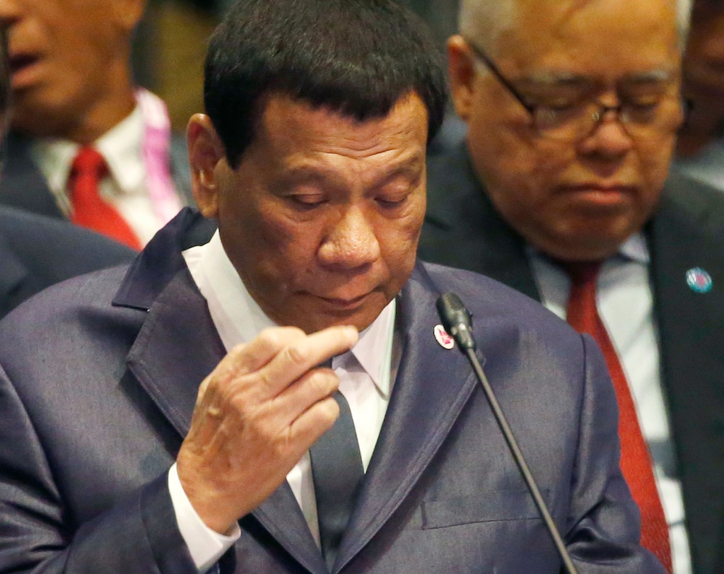 (AP Photo/Bullit Marquez, File) In this Nov. 14, 2018, file photo, Philippine President Rodrigo Duterte listens to a speech during a ASEAN Plus China Summit meeting in Singapore.