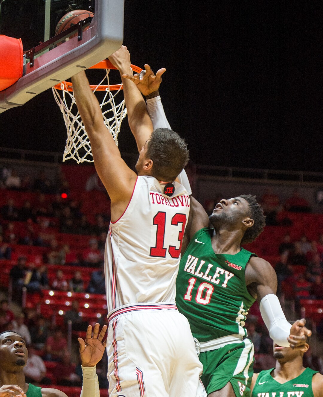 (Rick Egan  |  The Salt Lake Tribune)    Utah Utes forward Novak Topalovic (13) dunks the ball over Mississippi Valley State Delta Devils guard Zachary Barnes (0), in basketball action between Utah Utes and Mississippi Valley State Delta Devils at the Jon M. Huntsman Center, Thursday, Nov. 15, 2018.