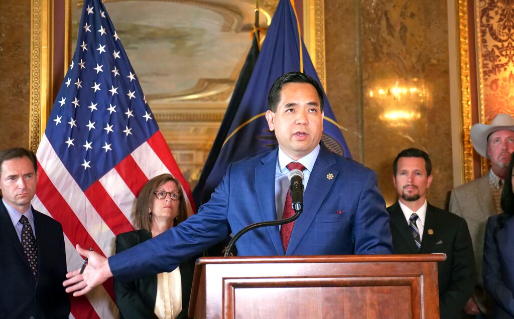 Utah Attorney General Sean Reyes speaks during a news conference Thursday, May 31, 2018, in Salt Lake City. Utah has filed a lawsuit accusing manufacturers of the opioid OxyContin of creating a drug abuse epidemic in the state. Reyes said that drugmaker Purdue Pharma misrepresented the risk opioids posed and the likelihood of addiction, amounting to fraud, negligence and a violation of state consumer protection law. (AP Photo/Rick Bowmer)
