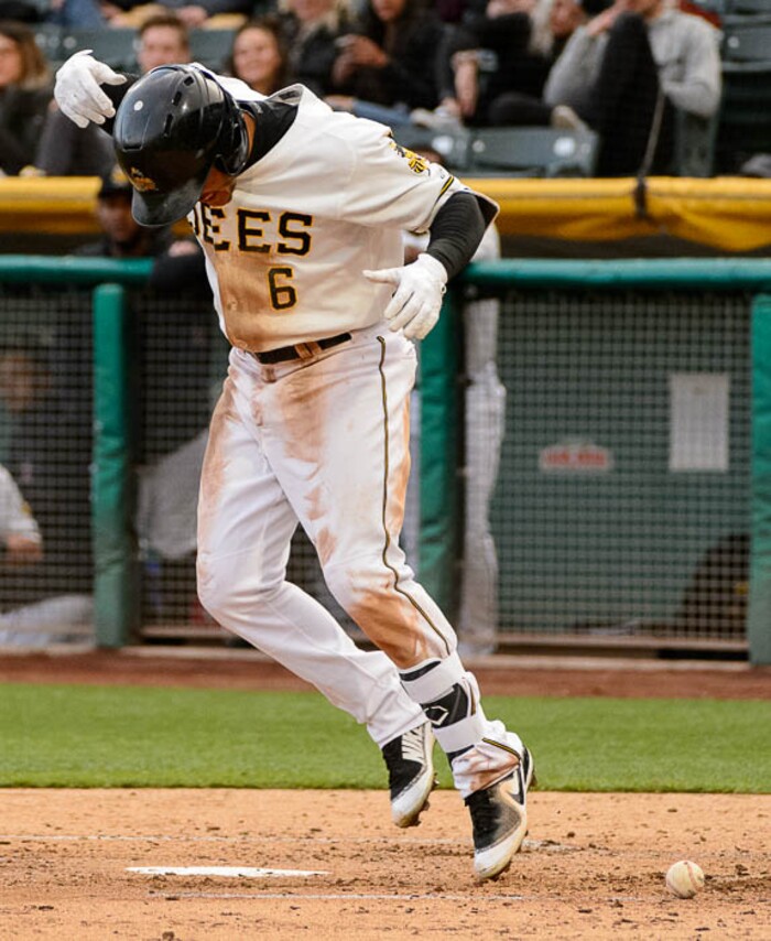 (Trent Nelson | The Salt Lake Tribune)  Salt Lake Bees vs. Albuquerque Isotopes, Triple-A baseball in Salt Lake City, Thursday April 5, 2018. Salt Lake's Michael Hermosillo (6) is hit by a pitch in the second inning.