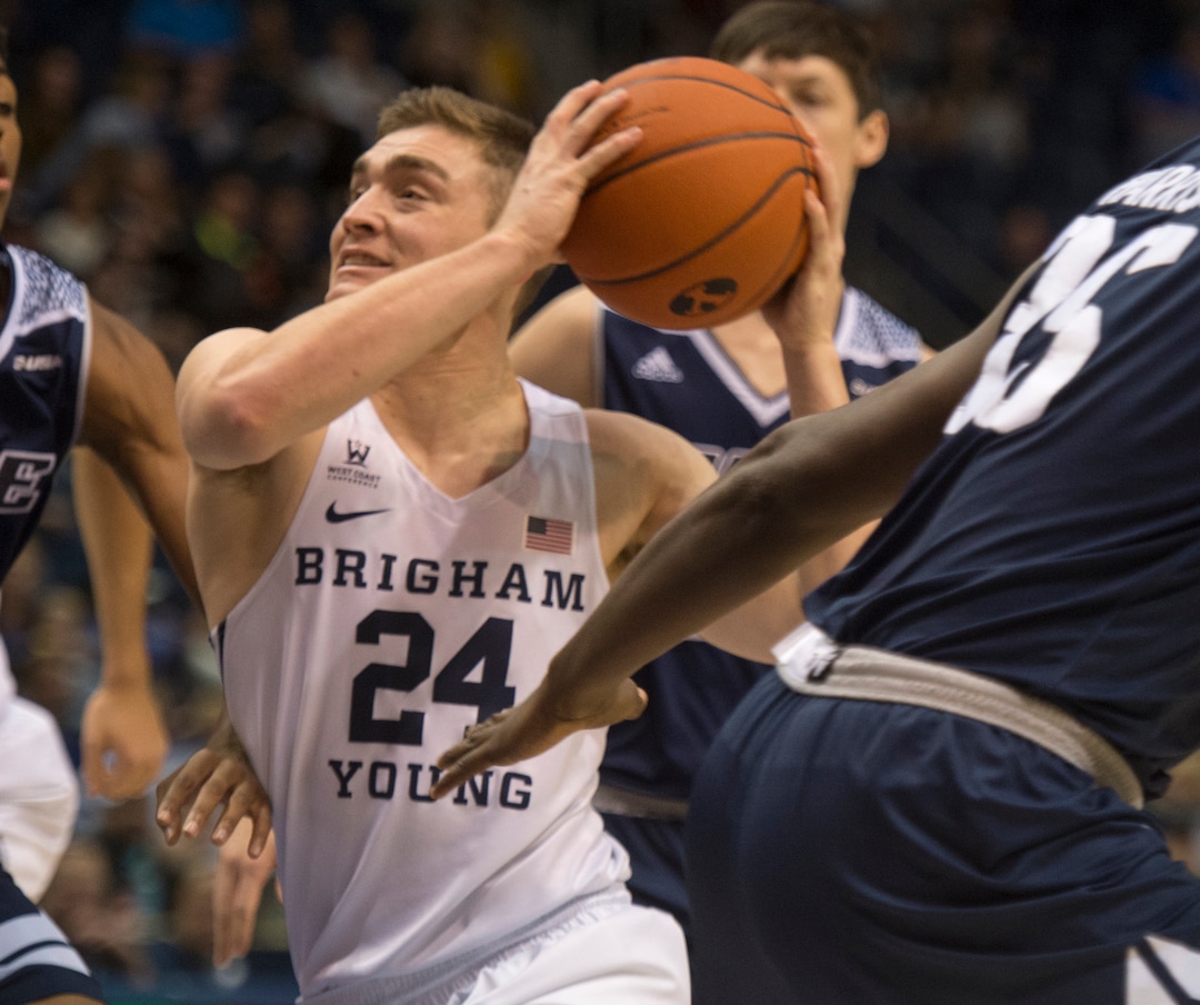 (Rick Egan  |  The Salt Lake Tribune)  Brigham Young Cougars guard McKay Cannon (24) takes the ball up the middle, in basketball action between Brigham Young Cougars and Rice Owls, at the Marriott Center in Provo, Wednesday, Nov. 21, 2018.